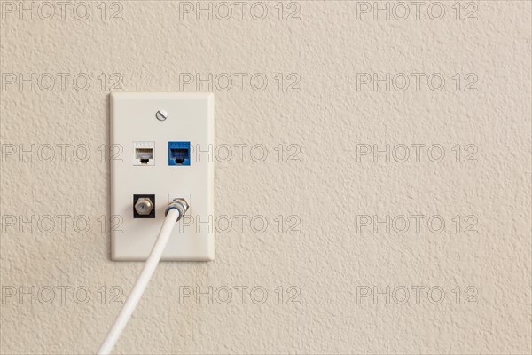 Multi-media wall plate with cable