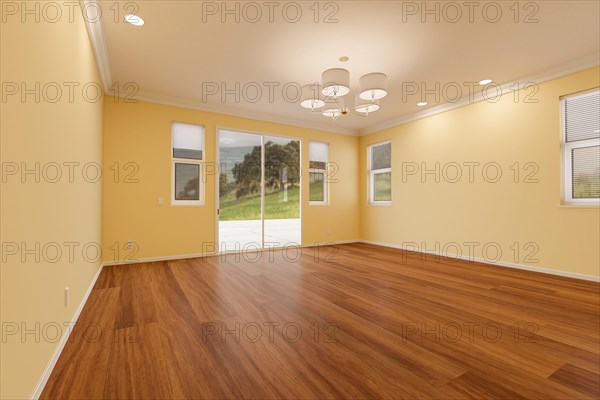 Newly remodeled room of house with finished wood floors