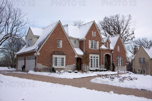 Majestic newly constructed home facade on a blustery day