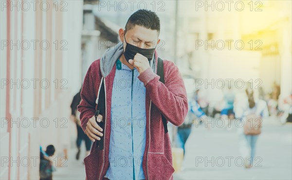 Coughing man with surgical mask