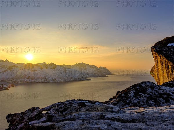 Sunset over the fjord Mefjorden with Mountains