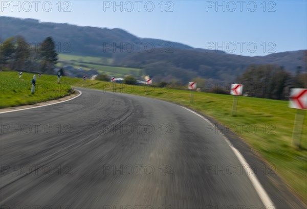 Speeding by speeder on dangerous winding country road