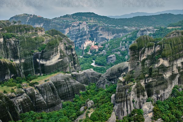 Monastery of Varlaam and Monastery of Rousanou and Monastery of Great Meteoron in famous greek tourist destination Meteora in Greece with scenic scenery landscape