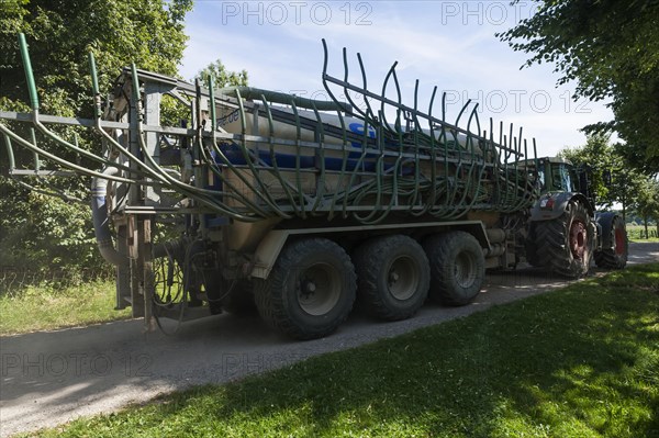 Large tractor with a slurry tanker