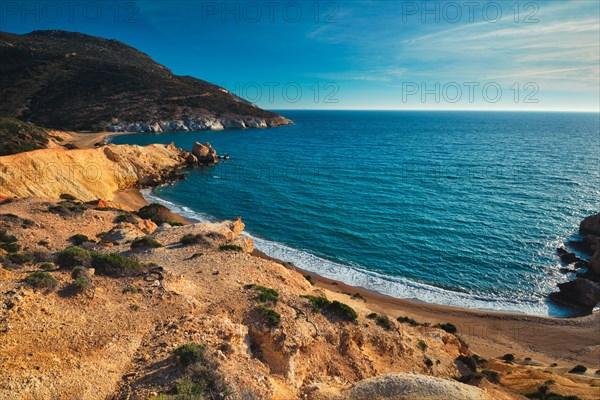 Agios Ioannis greek beach and Aegean sea on sunset