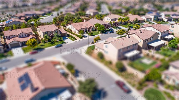 Aerial view of populated neigborhood of houses with tilt-shift blur