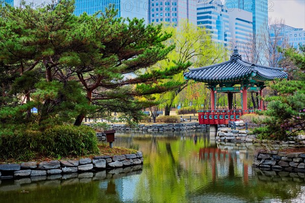 Yeouido Park public park pond with pavilion summerhouse in Seoul