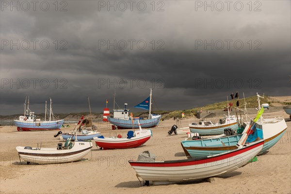 Dark sky over the harbour of Vorupoer