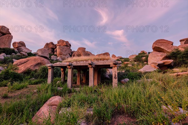 Ancient ruins in Hampi on sunset. Above Hampi Bazaar