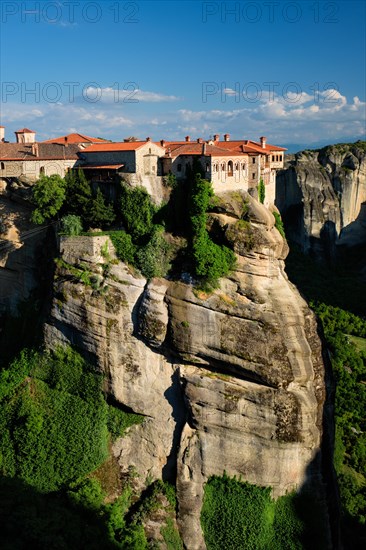 Monastery of Varlaam monastery in famous greek tourist destination Meteora in Greece on sunset with scenic scenery landscape