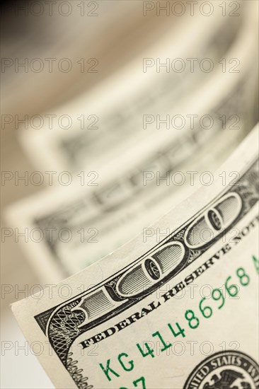 Abstract of one hundred dollar bills