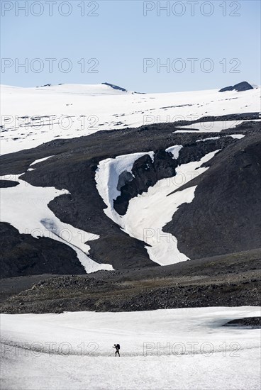 Hiker on snow field