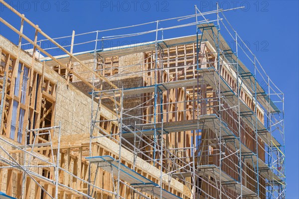 Scaffolding and wood framing at construction site