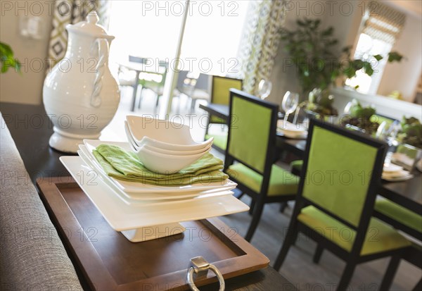Beautiful dining area of home with apple green accents