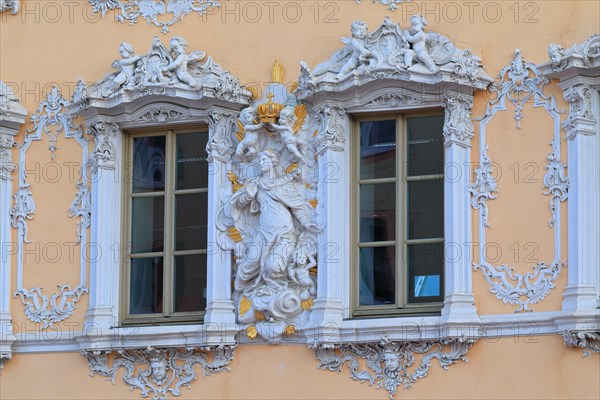 Figure of a saint on a house wall