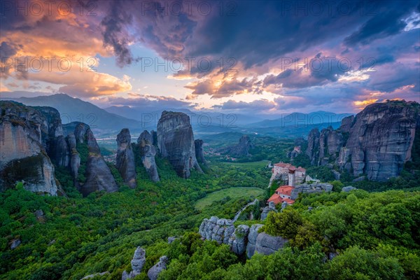 Sunset sky and monastery of Rousanou and Monastery of St