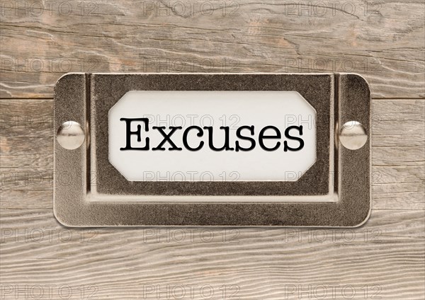 Excuses metal file cabinet label frame on wood