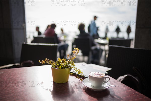 Cappuccino in a cafe on Lake Constance