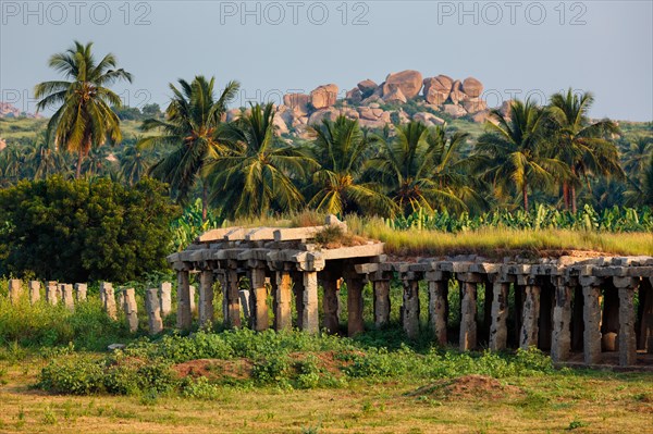 Ancient ruins of Hampi on sunset. Hampi