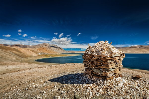 Stone cairn at Himalayan lake Tso Moriri