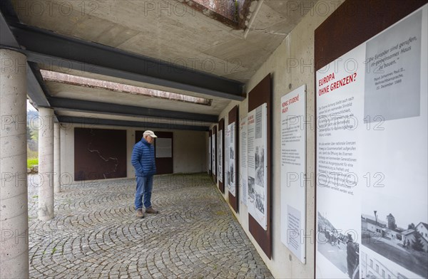 Hikers in front of the information boards of the Iron Curtain Memorial at the Guglwald border crossing