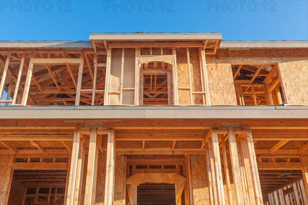 New wood house framing at construction site