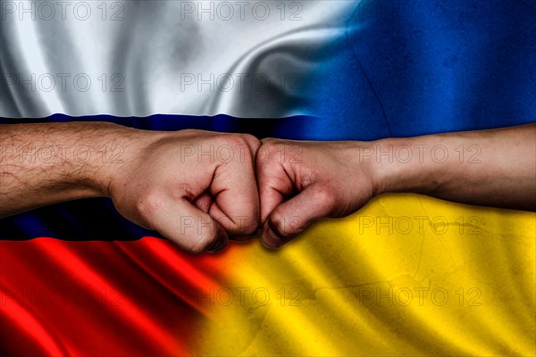 Russia vs Ukraine two fists bumping