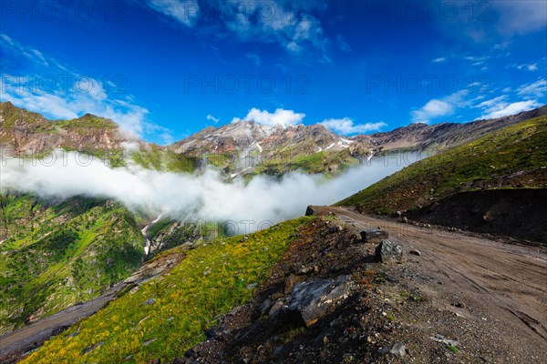 Road in Himalayas. Ascend to Rohtang La pass from Kullu valley