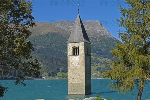 Church tower in the Reschenpass reservoir