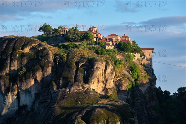 Great Meteoron Monastery in famous greek tourist destination Meteora in Greece on sunrise