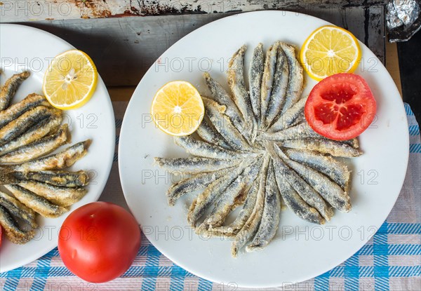 Tray with ready to fry anchovies fish fish as seafood