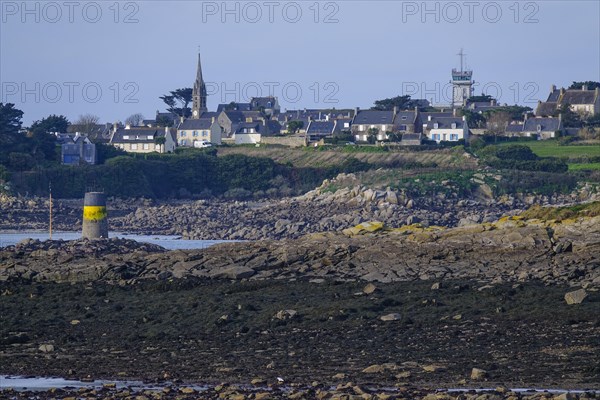 View at low tide from Roscoff to the island Ile de Batz with church