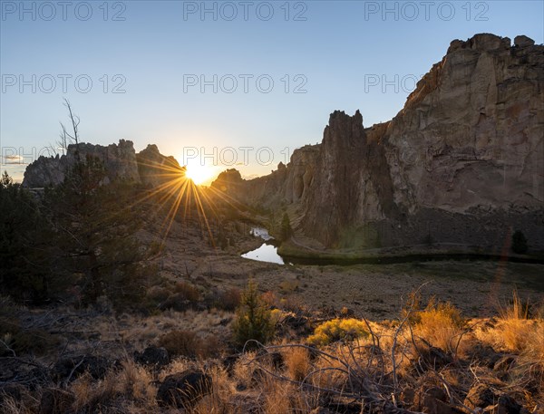 Sun star on rock walls