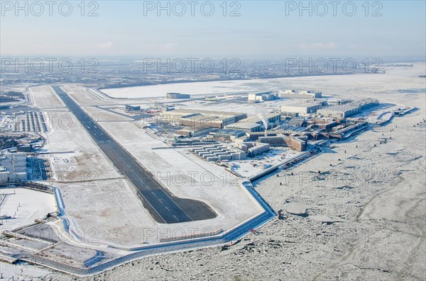 Airbus Werke Hamburg Finkenwerder in winter with ice on the Elbe