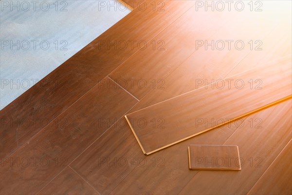 Newly installed brown laminate flooring abstract