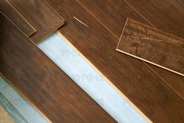 Newly installed brown laminate flooring abstract