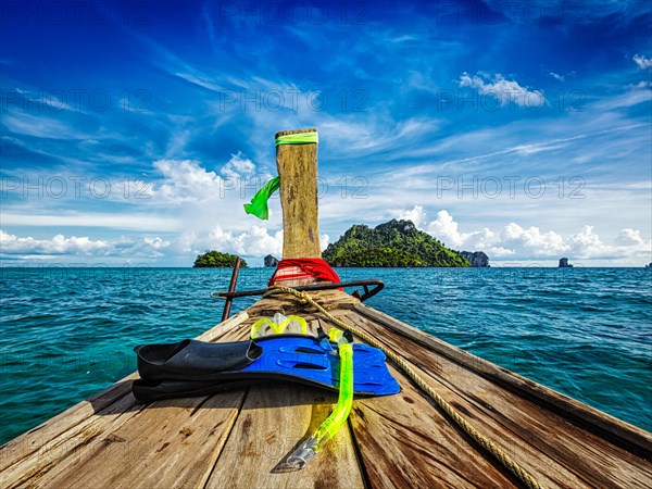 Snorkeling set on boat heading to tropical island in Thailand