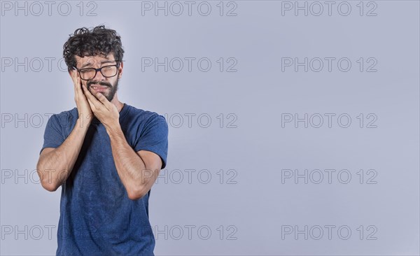 Attractive boy with toothache