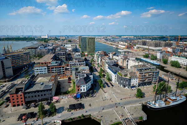 Aerial view of Antwerp city with port crane in cargo terminal. Antwerpen