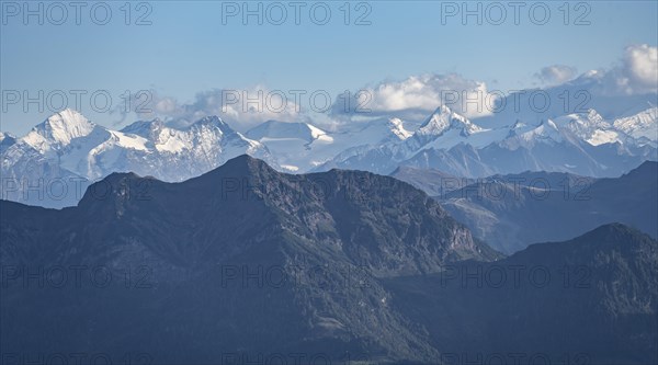 Snow-covered mountain peaks on the main ridge of the Alps