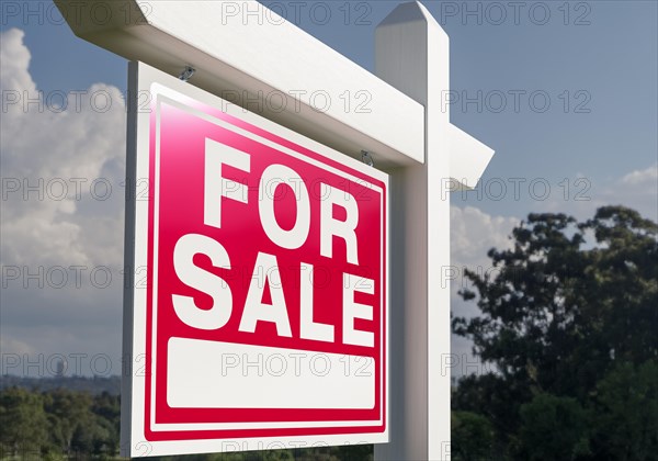 Close-up of house for sale real estate sign