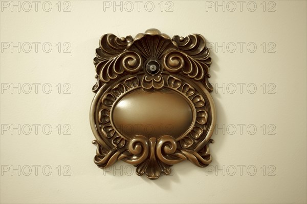 Elegant victorian peep hole on a door