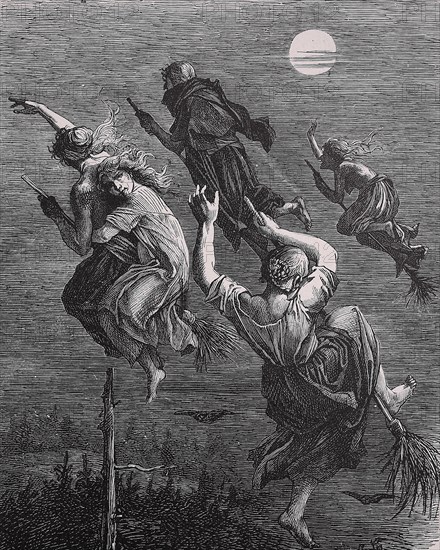 Witches riding a broom through the night