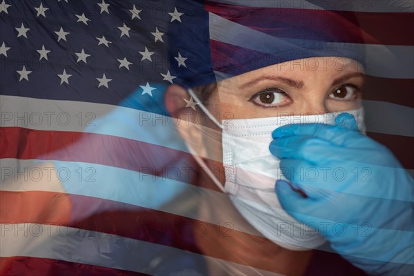 Doctor or nurse wearing medical face mask and scrubs with ghosted american flag