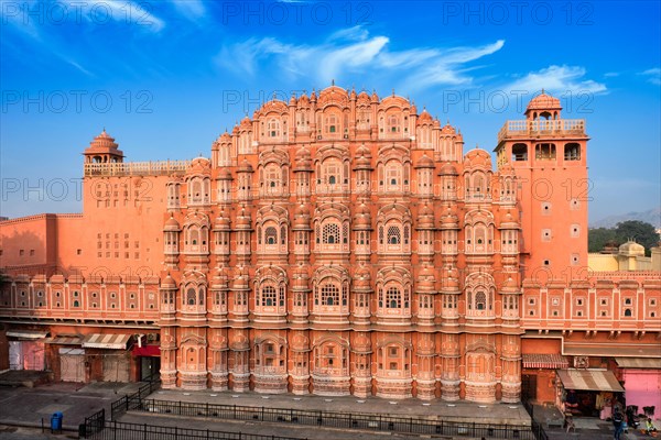 Famous landmak pink Hawa Mahal Palace of winds with people