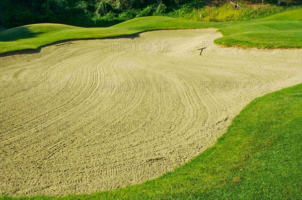 Abstract of golf course and sand bunker