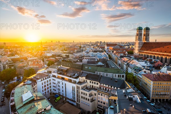 Aerial view of Munich and Frauenkirche from St. Peter's church on sunset. Munich