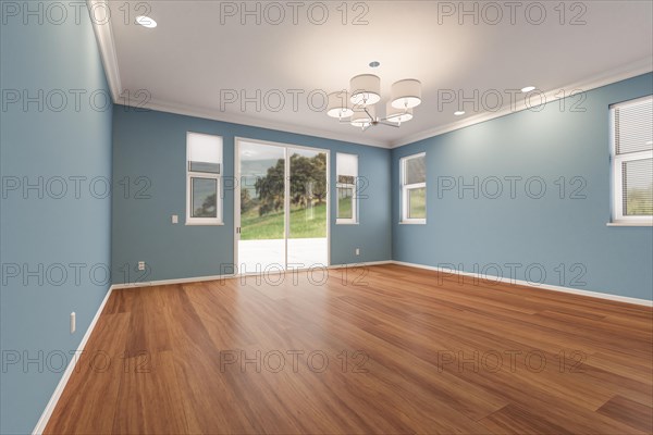 Newly remodeled room of house with finished wood floors