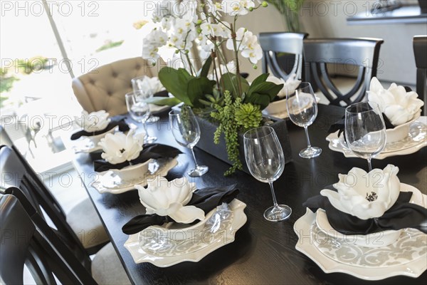 Beautiful abstract of dining table with place settings