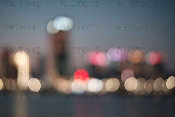 Bokeh lights of city buildings at night in Macau